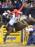 Round 7 Saddle Bronc (1303) Tanner Butner Dance Hall Dreamer Stace Smith.jpg